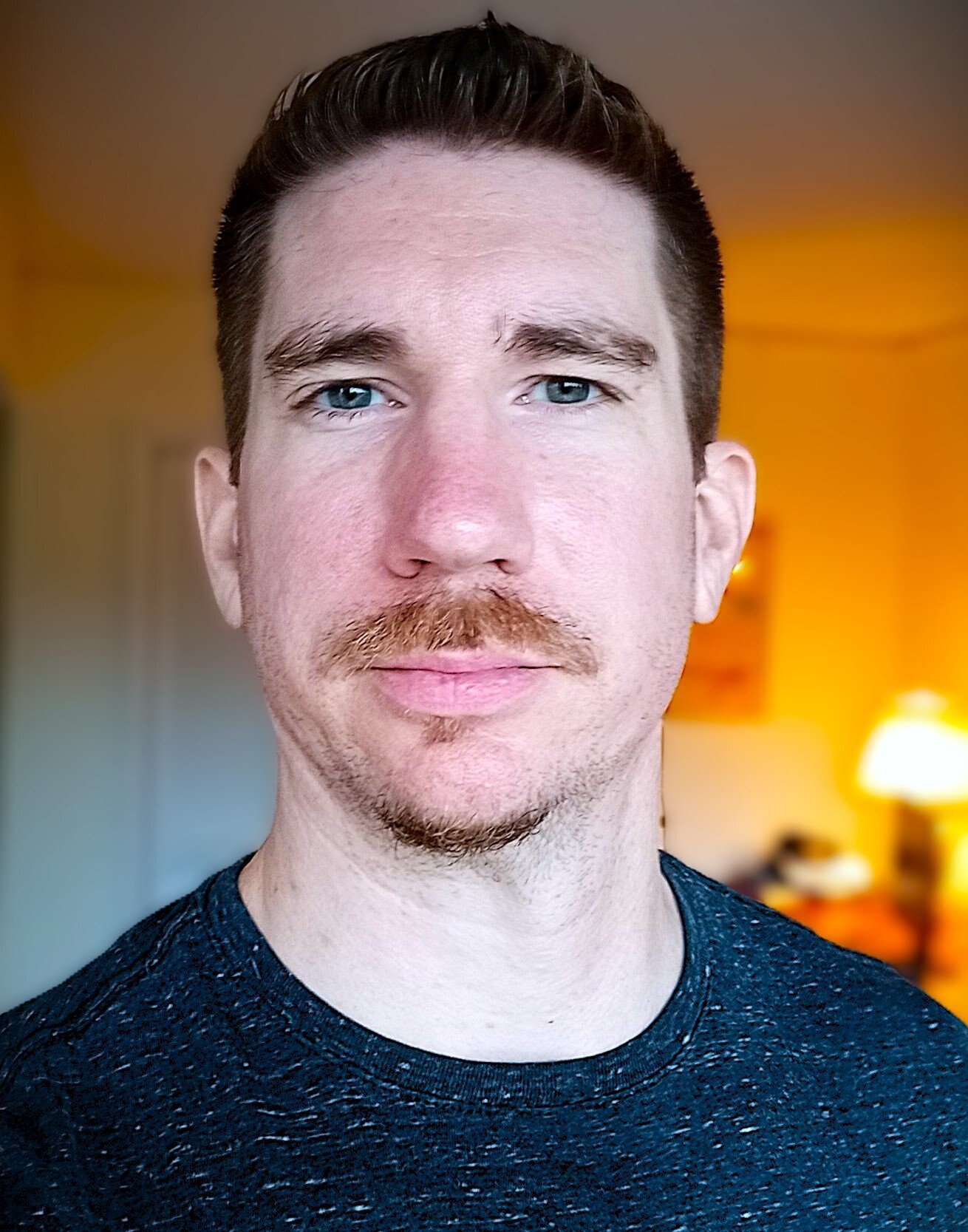 clean cut black shirt headshot 1.2